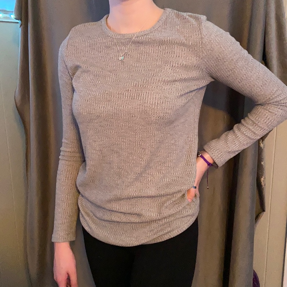 Thin, gray, long sleeve shirt.